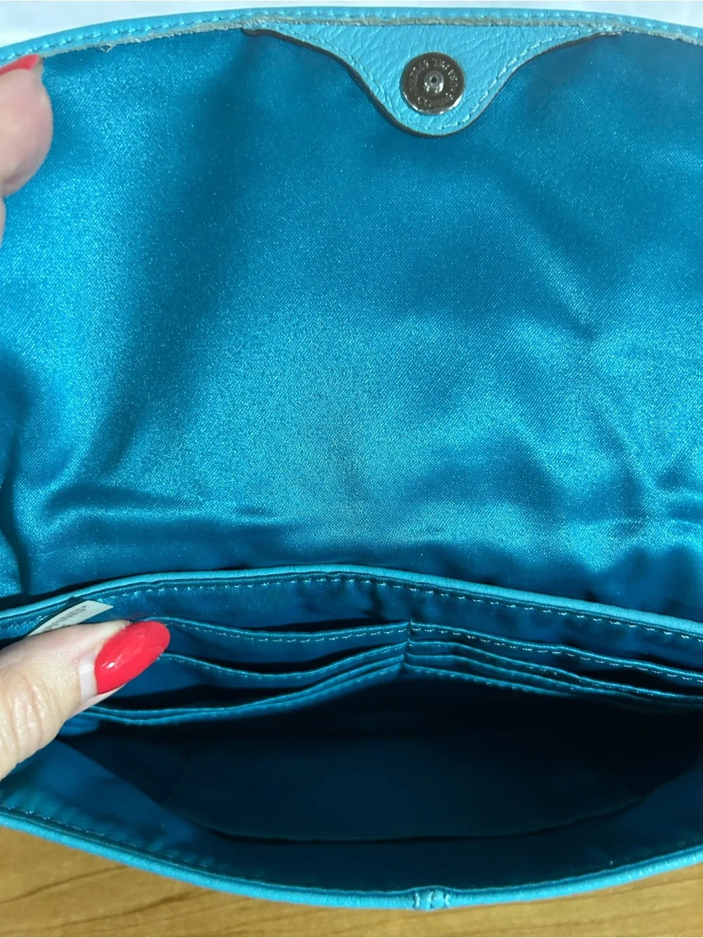 Coach Turquoise Pebbled Leather Wristlet